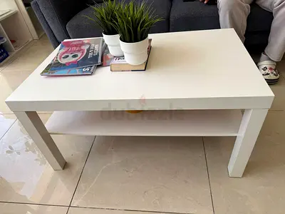 White rectangular coffee table with lower shelf - good condition