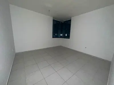 3-bedroom apartment with a living room for annual rent in Falcon Towers, Ajman.