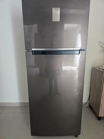 Used single-door stainless steel refrigerator - good condition