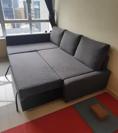 Grey L-shaped Sofa Bed with Storage — Good Condition