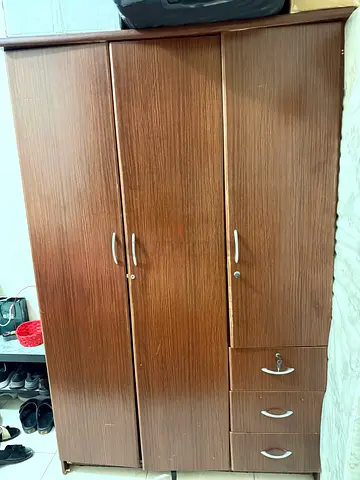 Three-door wooden wardrobe with drawers - good condition