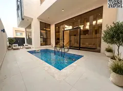 Luxury villa for sale with an elegant design, including electricity, water, air conditioning, and a