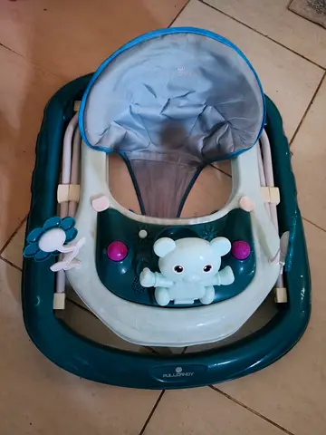Baby walker with toy tray and canopy - used