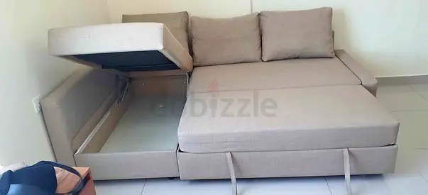 Grey L-Shaped Sofa Bed with storage Excellent condition