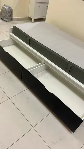 Single white daybed with storage shelves - good condition