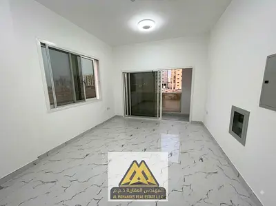 One bedroom and living room with balcony, first occupancy, large area with balcony, in Al-Aliya area, close to all services and main roads