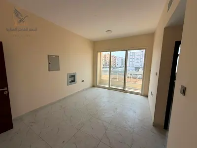 For annual rent: a brand new, two-bedroom apartment in Al Jurf 3, Ajman. Spacious and in a prime location near Mohammed Bin Zayed Road, close to ameni