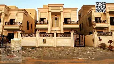 Villa for sale in Ajman, Al Helio area, including registration fees. 6 bedrooms, master roof terrace, majlis, living room, and maid's room. Open to al