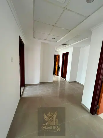 Two Bedroom Apartment for Rent in Al Qasimia Al Mahatta with Two Bathrooms Prime Location and Easy Access to All Essential Services and Facilities