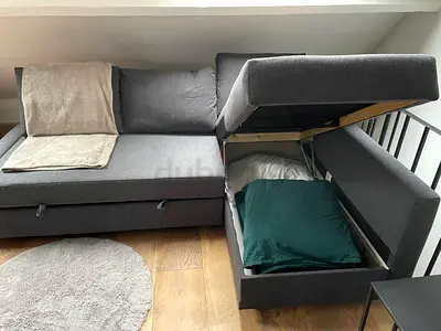 Grey L-Shaped Sofa Bed with Integrated Storage