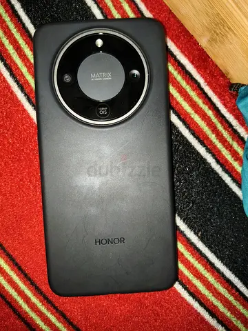 Honor X9D smartphone with protective case - good condition