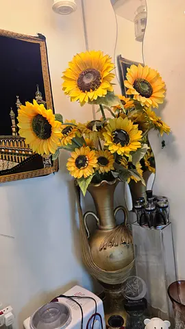 Decorative artificial sunflower arrangement with large ceramic vase