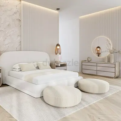 Minimalist Cream Platform Bed with Matching Nightstands and Poufs