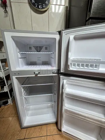 Used top-freezer refrigerator in good working condition