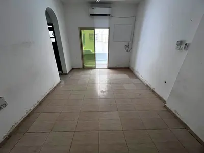 One bedroom and living room for annual rent, large area, comfortable layout, flexible payment options, parking under the building