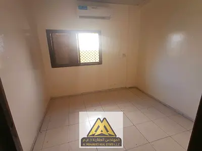 For annual rent: 2 bedrooms and a living room in Al Nuaimiya 2, 1 bathroom, split AC, maintenance b