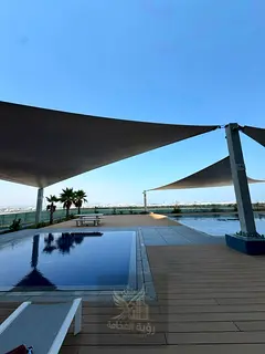 For annual rent in Al Mamzar Sharjah at La Plage Tower two bedroom apartment with master bedroom ann