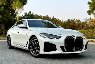 AGMC Warranty & Service | 2022 BMW 420i M Sport Grand Coupé | Pearl White | Red Interior