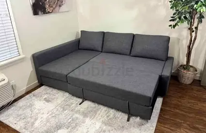 Grey L-shaped Sofa Bed with Storage — Good Condition