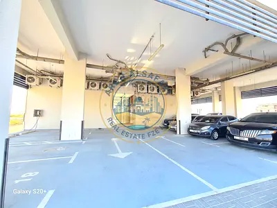 One month free Spacious 2BHK Apartment with all master bedrooms, Balcony, covered Parking in tilal city sharjah