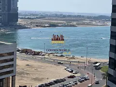 1BR Al Taawun: balcony, free parking, deluxe finishes, partial sea view, master bedroom, American ki