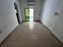 One bedroom and living room for annual rent, split air conditioning, spacious, maintenance included