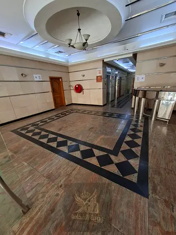 Two-bedroom apartment for annual rent in Al Qasimia, Sharjah, featuring two bathrooms, central AC,