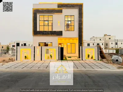 Luxury villa for sale in Al Yasmin | 6 master bedrooms | 3 living rooms | 2 floors + roof | Freehold ownership for all nationalities