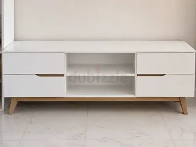 White wooden TV cabinet with storage drawers and open shelves