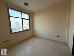 Two-bedroom apartment with a living room for annual rent in Al Rawda 1, Ajman. Central air condition