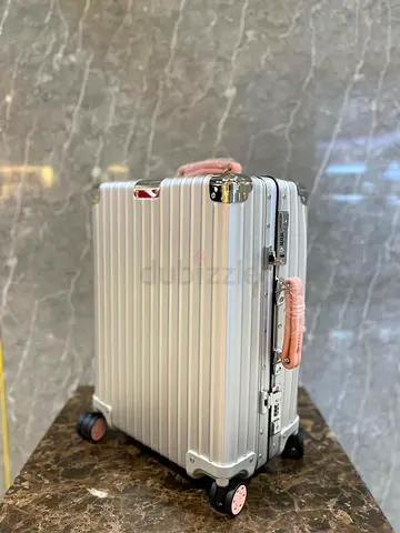 Rimowa silver with pink Handel
