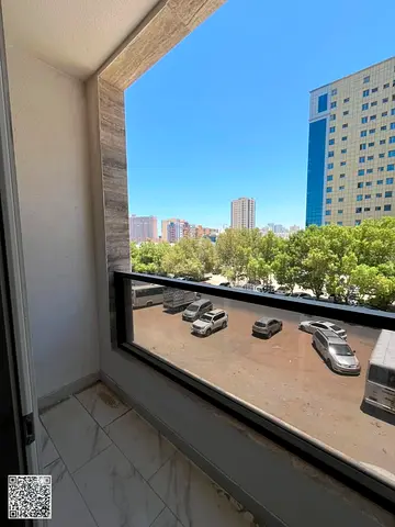 2-bedroom apartment for annual rent in Al Nuaimiya, featuring a living room and an open view.