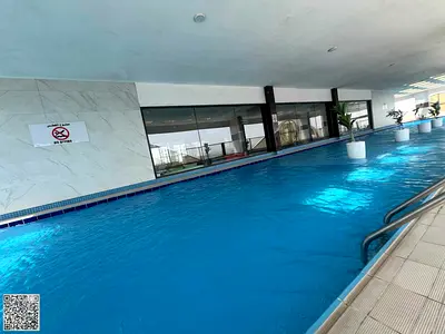 **Two-Bedroom Apartment and Living Room with Spacious Layout, 3 Bathrooms, Gym, Swimming Pool, and Aqua Park in Al Rashidiya 1.