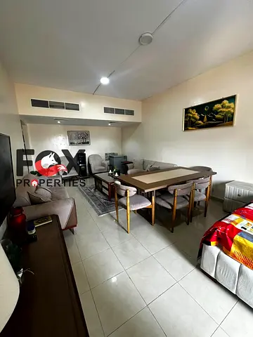 Spacious two-bedroom apartment with a living room for annual rent in Ajman,in Horizon Towers,Al Ras