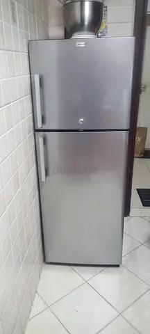 Silver double-door refrigerator - good working condition