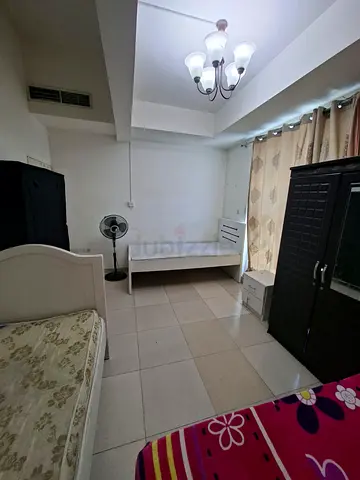 Spacious Partition Room with Balcony Available Prime Location Al Khail heights Al quoz