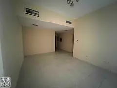 For annual rent – 2-bedroom apartment with a living room and 2 bathrooms in Garden City Towers –