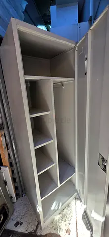 Metal storage cabinet with multiple compartments - sturdy workshop unit