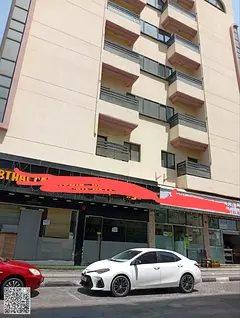 **Building for sale in Al Bu Tina, Sharjah, consisting of 56 units.