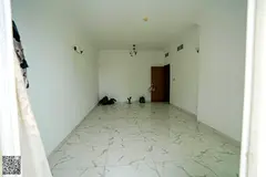 Two bedrooms and a living room for annual rent in Al Waha Towers