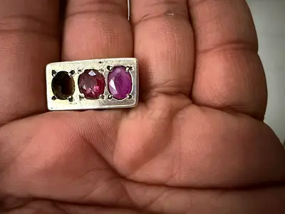 Sterling Silver Ring with Three Ruby/Garnet Oval Stones