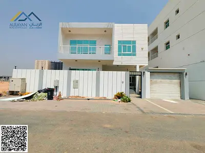 Modern villa with spacious areas, two kitchens, and a maid's room in a quiet location in Al-Amirah,