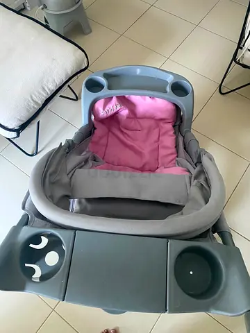 Gray stroller with pink liner - used, good condition.