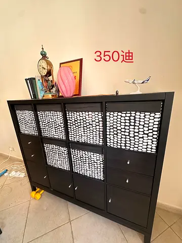 Black Storage Cabinet with Drawers and Decorative Panels - Good Condition
