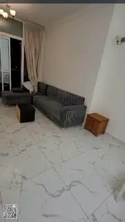 2-bedroom apartment with a living room for sale in Oasis Towers, ideal for both residential living a