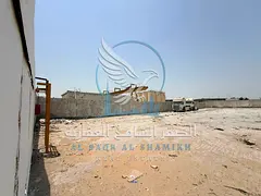 Prime 20,000 Sqft Interlocked Industrial Yard for Rent in Al Sajaa Sharjah | 50 kW Power | Includes