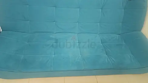 Turquoise sofa bed - good condition, comfortable convertible couch