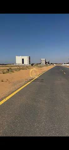 For sale: Residential land in Basateen Al-Zubair, area 4850 sq. ft., prime location opposite the park, direct, ground +2 permit, freehold ownership fo