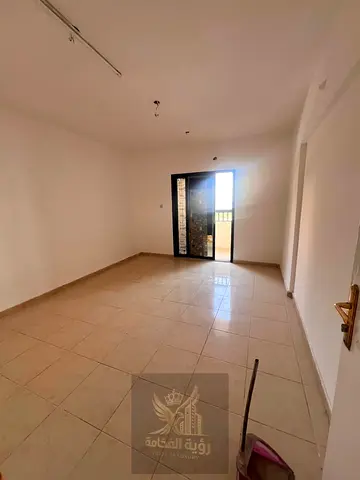 For rent in Al Majaz 2 three bedrooms and living room bachelor accommodation three bathrooms one master bedroom two balconies annual rent 48000 AED pa