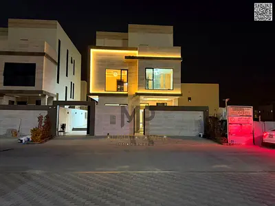 Villa with (pool and lift)|ajman|al yasmeen|4 master rooms, majlis, 3 halls, maid room, roof|freehold|price included central A/C.